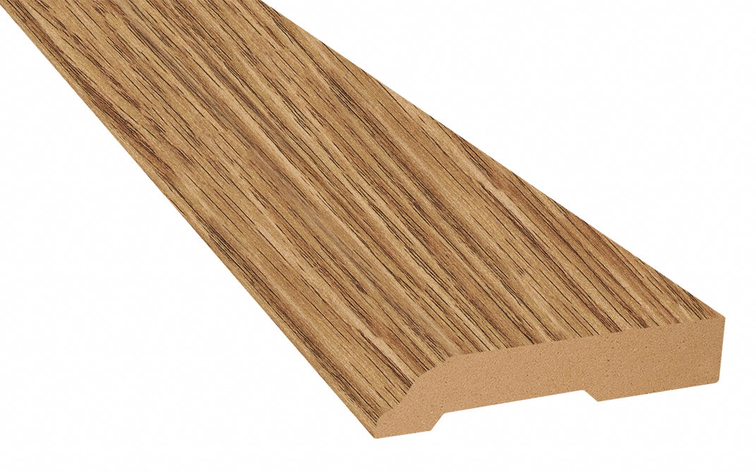 Ebb Tide Oak Laminate 3-1/4 in. Tall x 0.63 in. Thick x 7.5 ft. Length Baseboard
