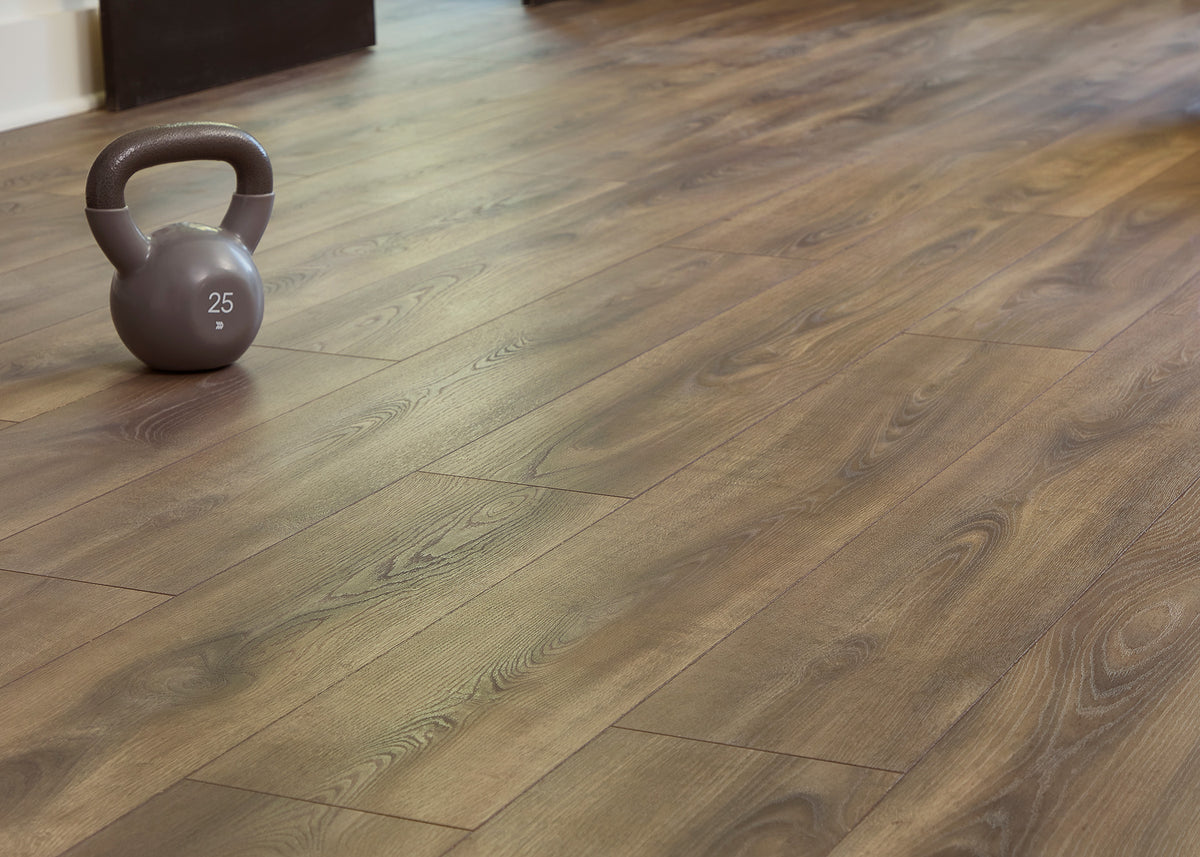 12mm Almond Crate Oak w/pad Water-Resistant Laminate Flooring 7.48 in. Width x 50.6 in. Length