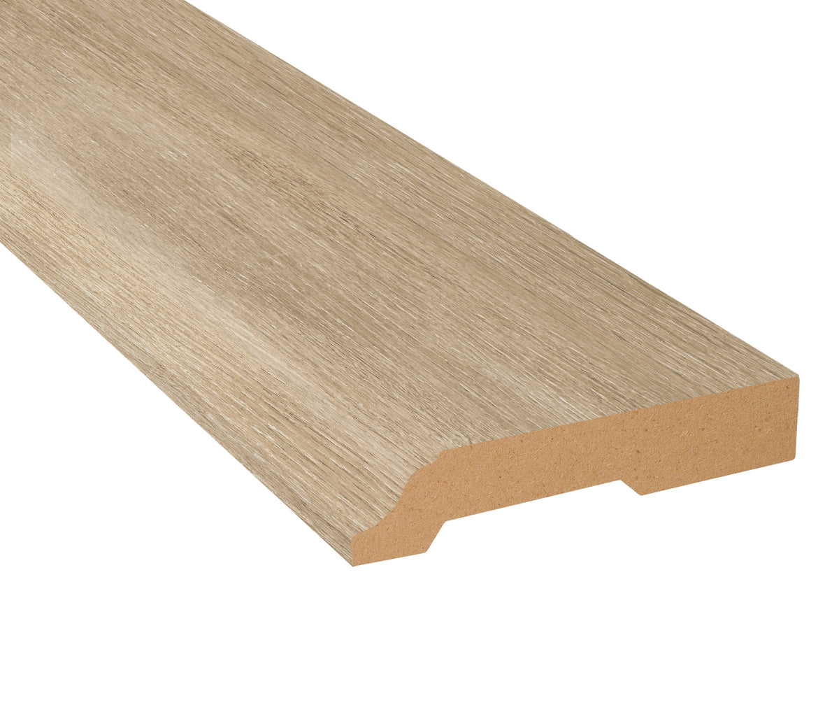 Capistrano Beach Oak Laminate 3-1/4 in. Tall x 0.63 in. Thick x 7.5 ft. Length Baseboard