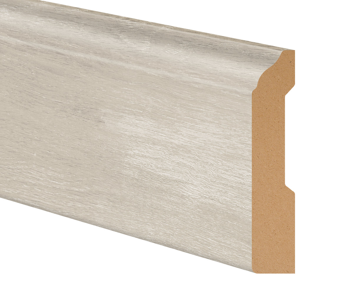 Grace Harbor Oak Laminate 3-1/4 in. Tall x 0.63 in. Thick x 7.5 ft. Length Baseboard
