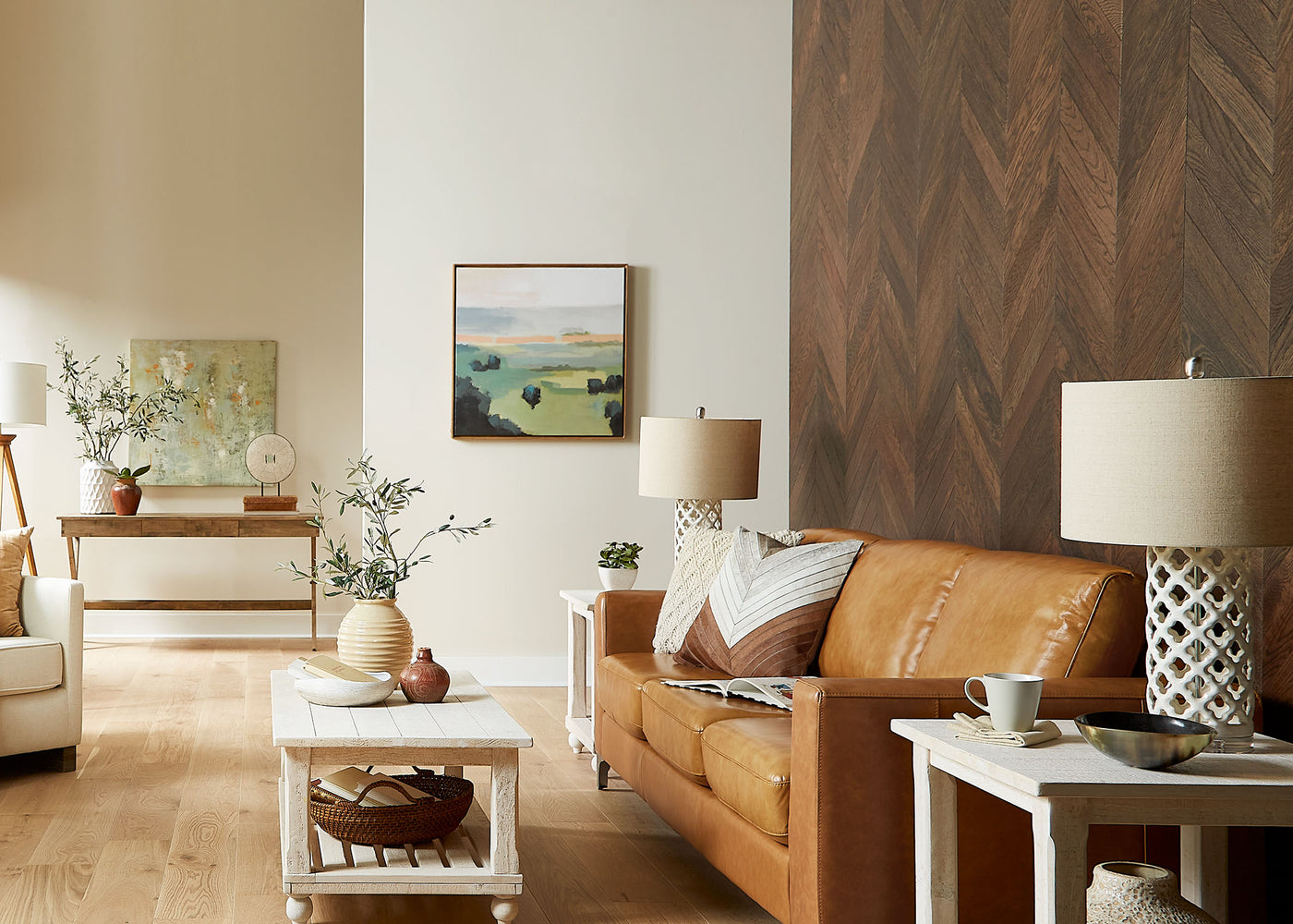 Living room with Virginia Mill Works Manhattan Chevron Prefinished Engineered Hardwood Flooring installed on the wall