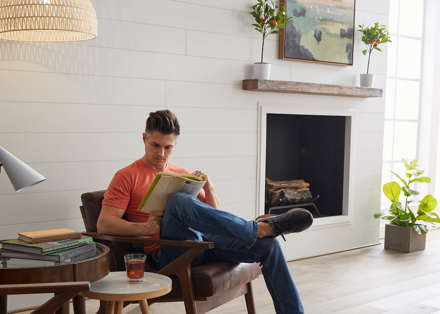 Shiplap wall decor installed onto a wall with a fireplace in a living room.