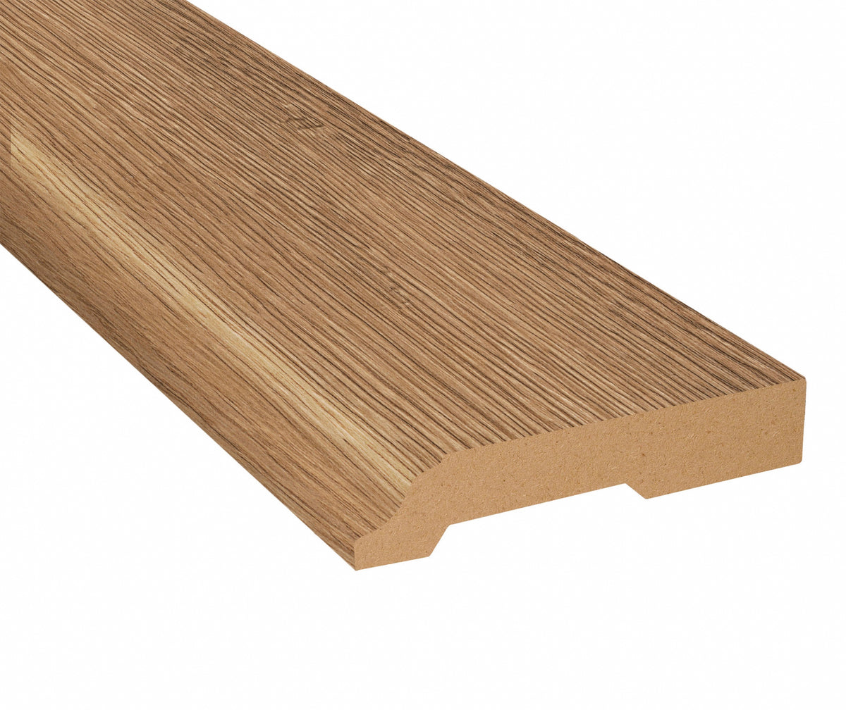 Wheat Field Oak Laminate 3-1/4 in. Tall x 0.63 in. Thick x 7.5 ft. Length Baseboard