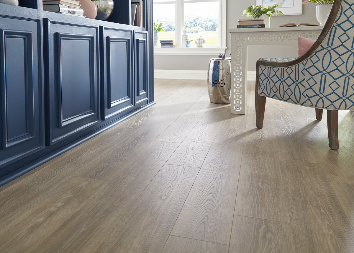 12mm Capistrano Beach Oak Water-Resistant Laminate Flooring 7.48 in. Width x 50.60 in. Length