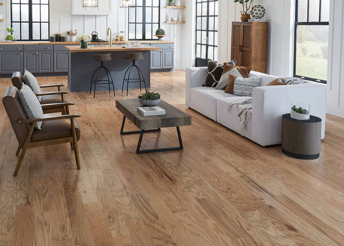 Open space kitchen and living room with Builder's Pride Red Oak Natural Prefinished Engineered Hardwood Flooring