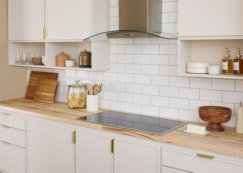 Kitchen with white tile backsplash and Williamsburg Butcher Block Co Unf. Signature Maple 12 ft. L x 25 in. W x 1-1/2 in. Thick Solid Butcher Block Countertop